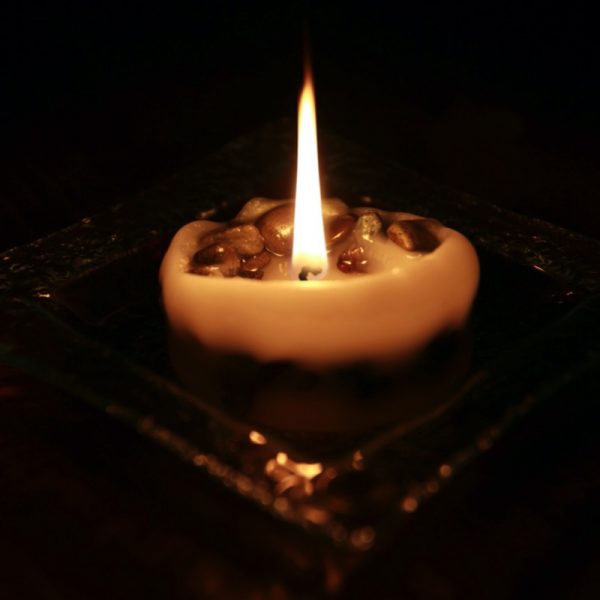 Our medium and large candle flame lingers amongst the pebbles or many hours toward the end of the candles life.