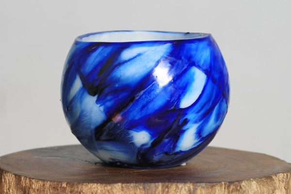 The blues on this lantern are in the rich tones of cobalt and lapis lazuli. Photo: Integrity Candles