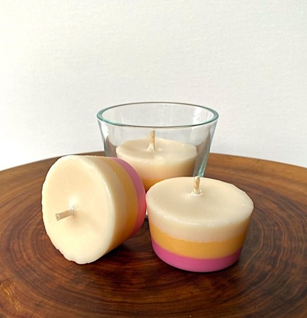 Three Frangipani & Ylang Ylang pure soy Votives, with one glass, burn brightly for a total of 36 hours with a delightfully playful and sweet aroma.