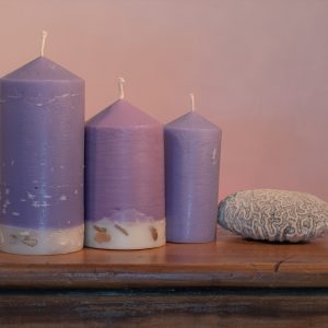 Deeply relaxing, this blend of essential oils includes Lavandula Angustifolia, Patchouli, Citrus, Marjoram, Jojoba, Geranium and Chamomile. A meditative shade of purple, the range features a white base embedded with river stone.