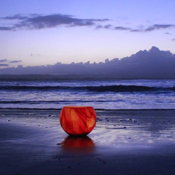 Simply beautiful, the Helios Lantern makes a striking contrast to twilight at the beach. Photo By Frank Gumley
